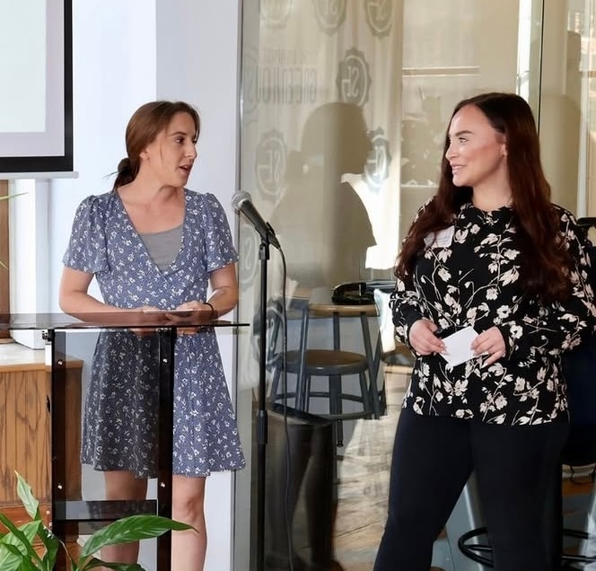 Grace Mathews and Jessica Facey, RN presenting Flor for Nurses at Social Enterprise Greenhouse